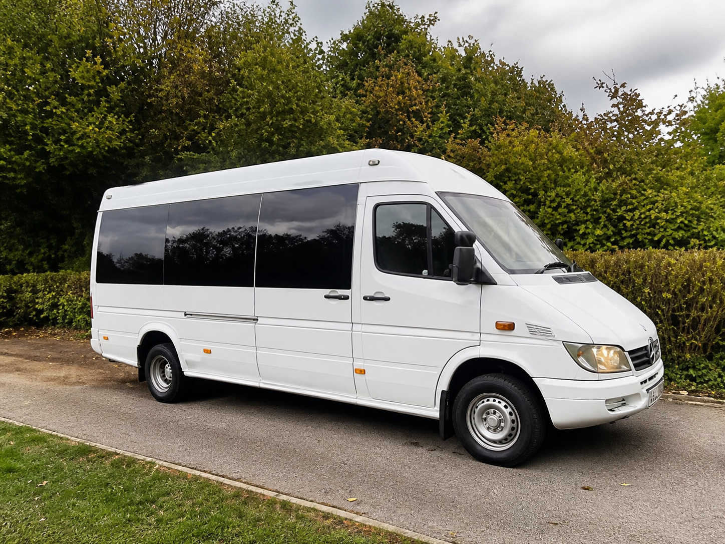 White group passenger minibus